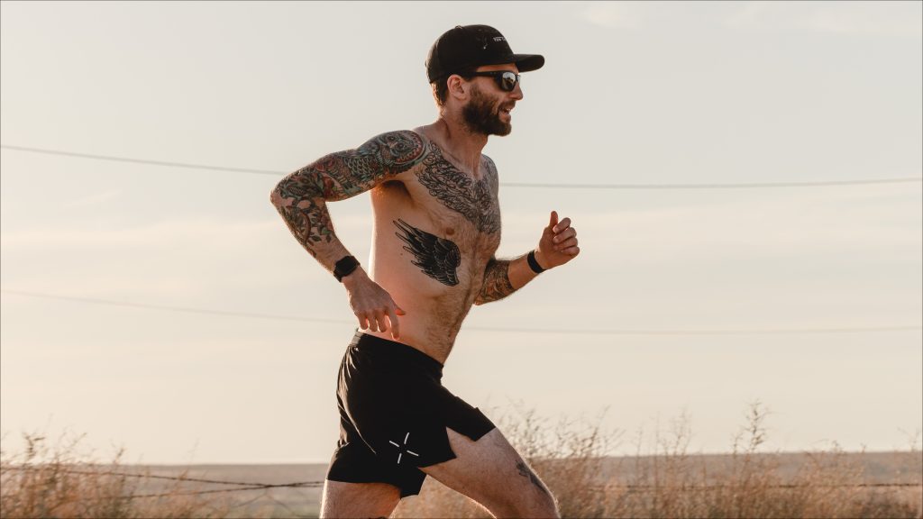 Ten Thousand shorts guy with tattoos running