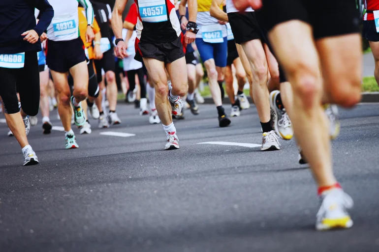 Large group of runners running a marathon