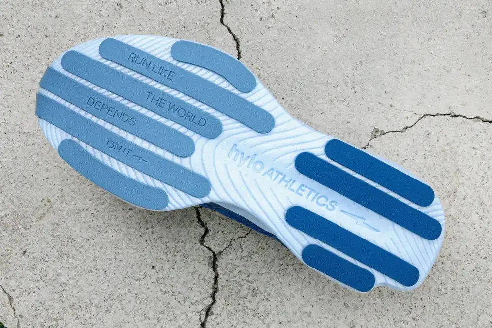 Hylo Impact Blue outsole view on concrete background