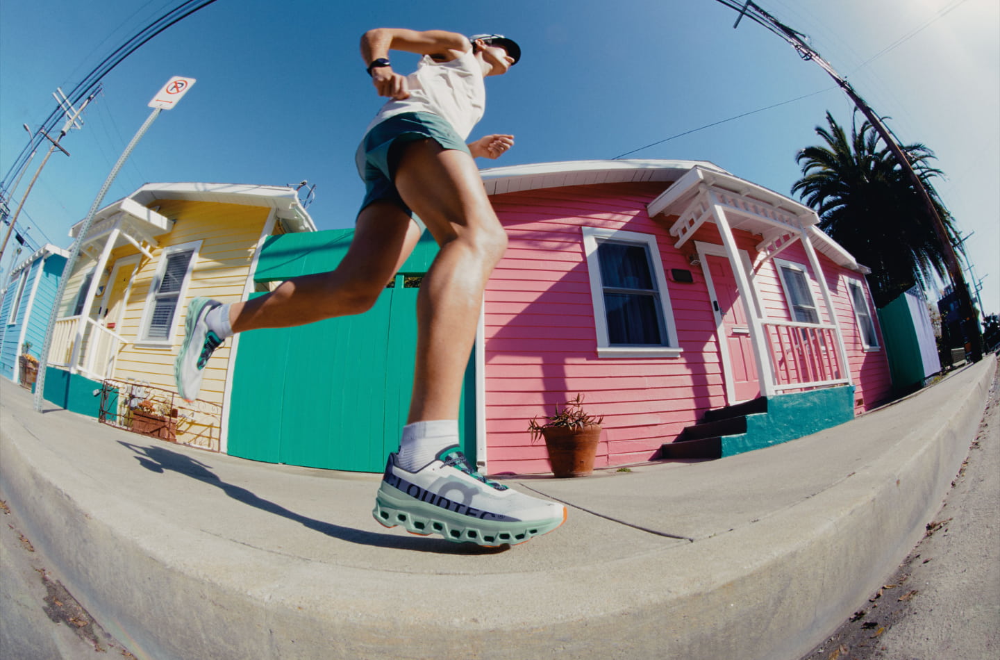 Man running in On Cloudmonster running shoes