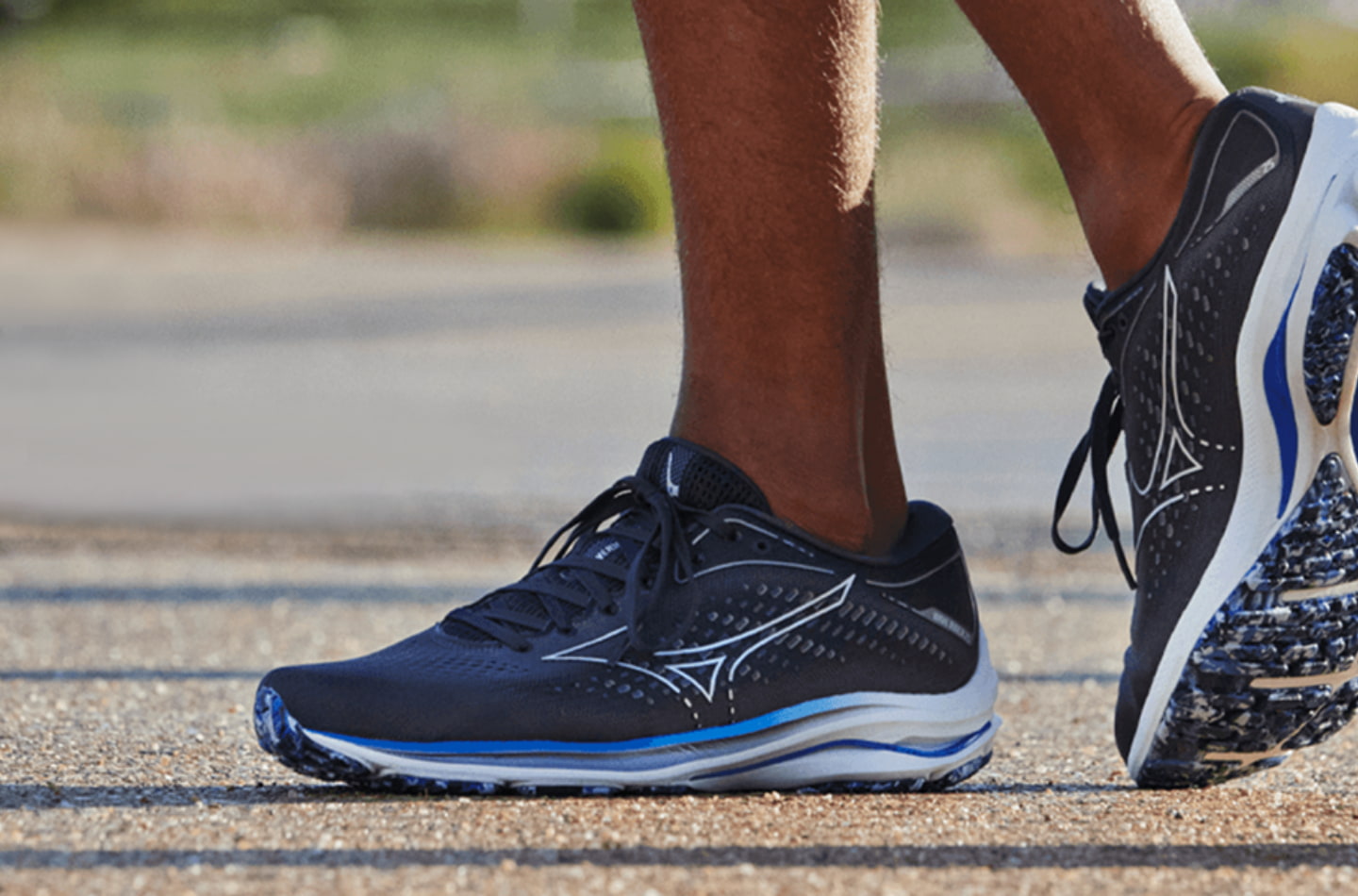 Man wearing the Mizuno Wave Rider running shoes